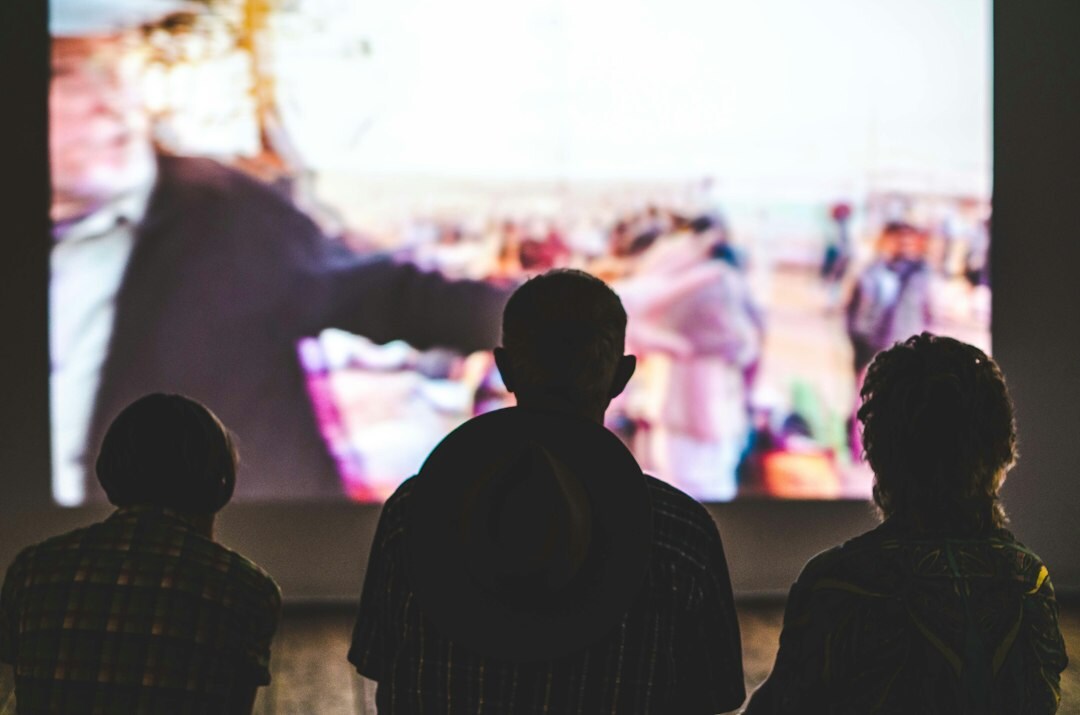 people watching tv together